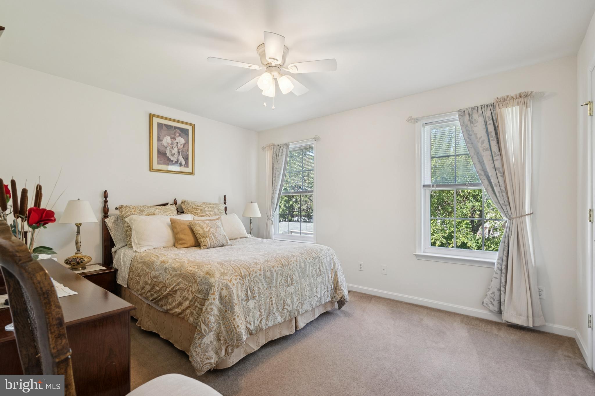 217 Cleveland Avenue Riverside, NJ 08075 - Photo 18 of 25 a bedroom with a bed and a window