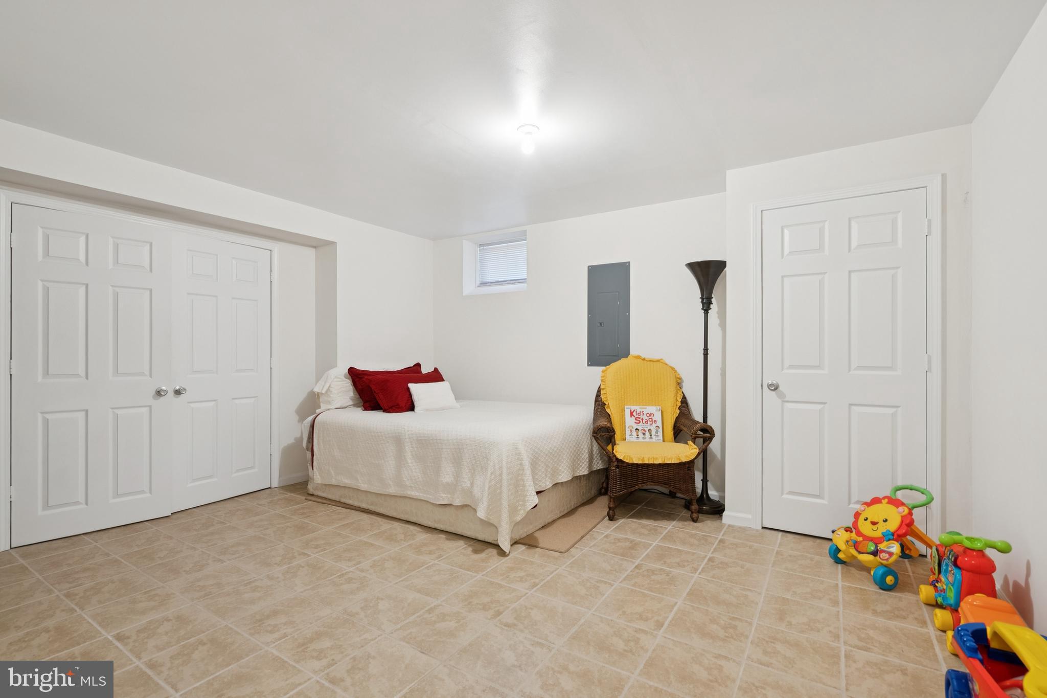 217 Cleveland Avenue Riverside, NJ 08075 - Photo 21 of 25 a bedroom with a bed and window