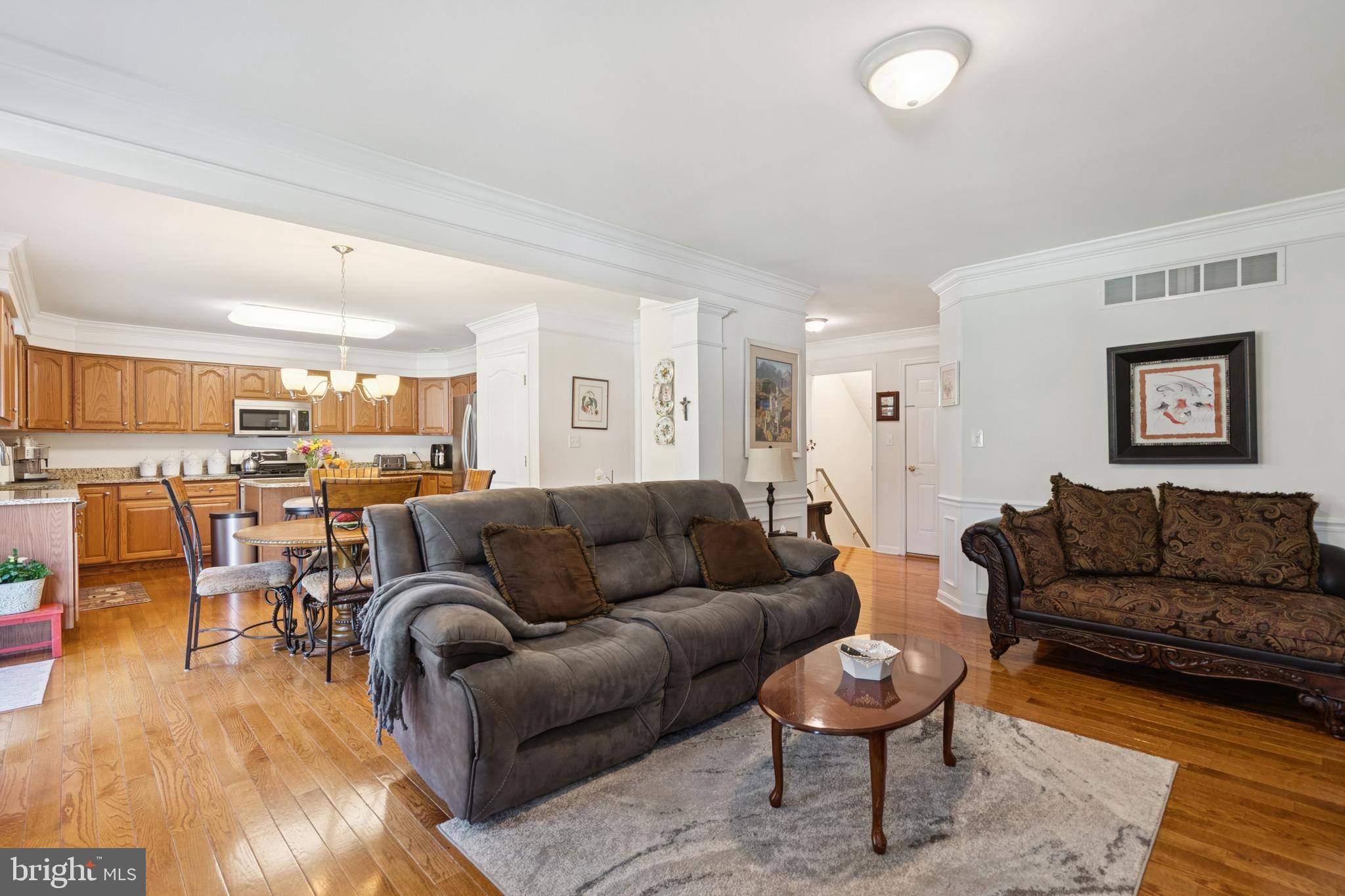 217 Cleveland Avenue Riverside, NJ 08075 - Photo 6 of 25 a living room with furniture and kitchen view