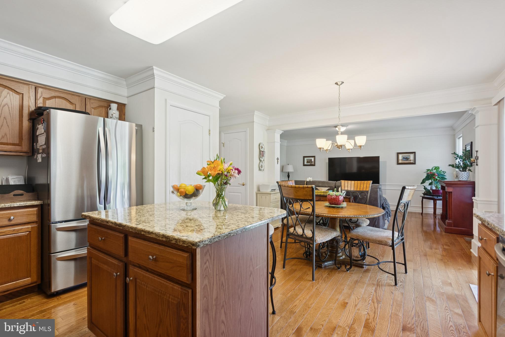 217 Cleveland Avenue Riverside, NJ 08075 - Photo 10 of 25 a view of a dining room with furniture and chandelier