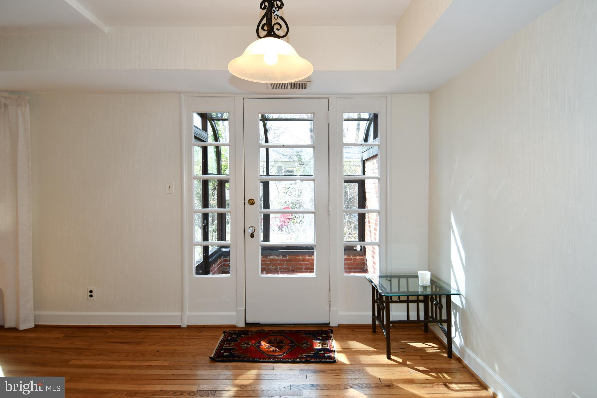 8520 Geren Road, Unit 183 Silver Spring, MD 20901 - Photo 12 of 34 a view of room with window and wooden floor
