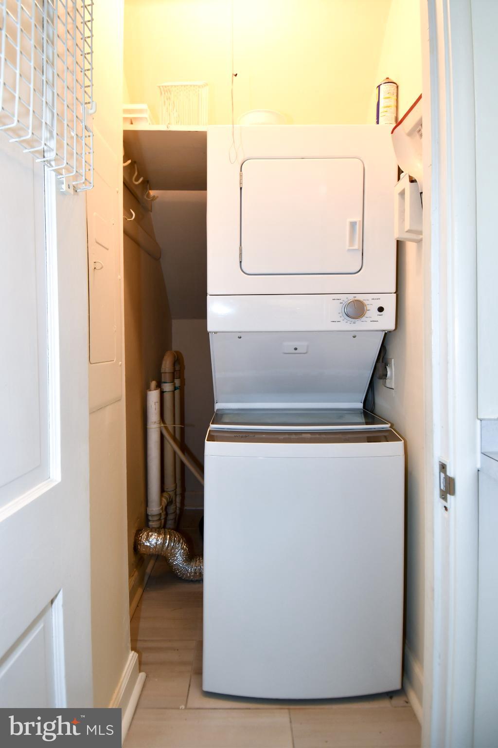 8520 Geren Road, Unit 183 Silver Spring, MD 20901 - Photo 21 of 34 a utility room with dryer and washer