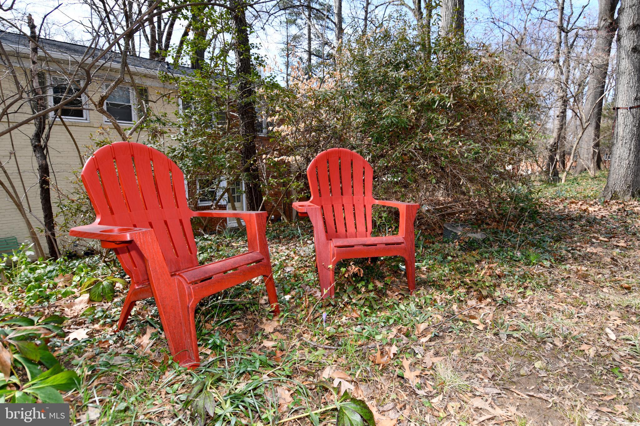8520 Geren Road, Unit 183 Silver Spring, MD 20901 - Photo 32 of 34 a backyard view with sitting space and trees