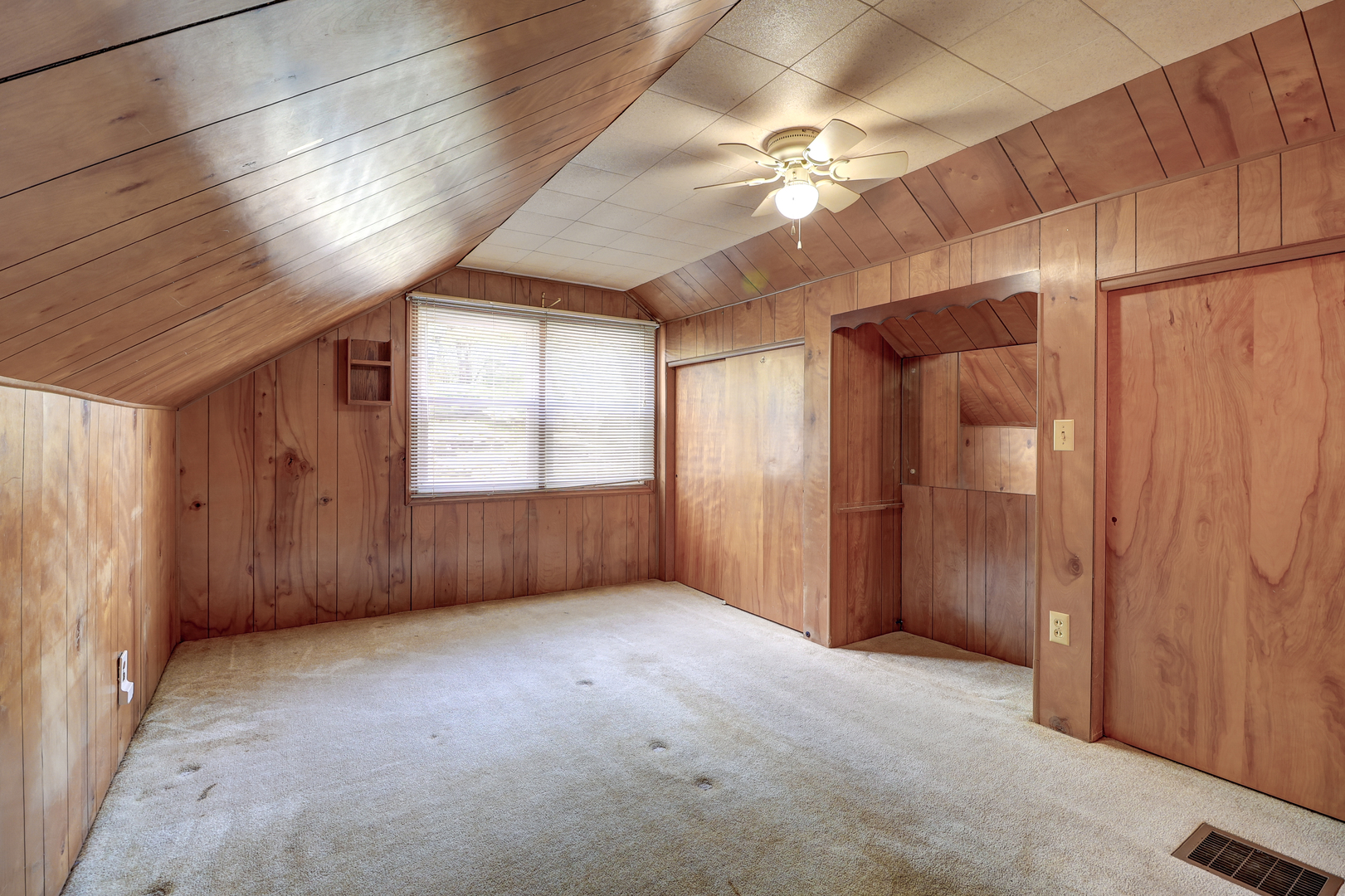 24839 Indian Ridge Road Sterling, IL 61081 - Photo 20 of 33 an empty room with windows and fan