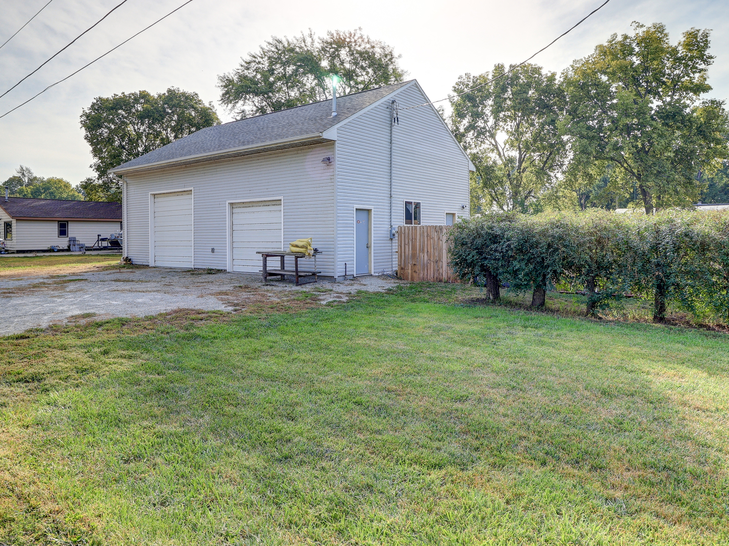 24839 Indian Ridge Road Sterling, IL 61081 - Photo 3 of 33 a house view with a garden space