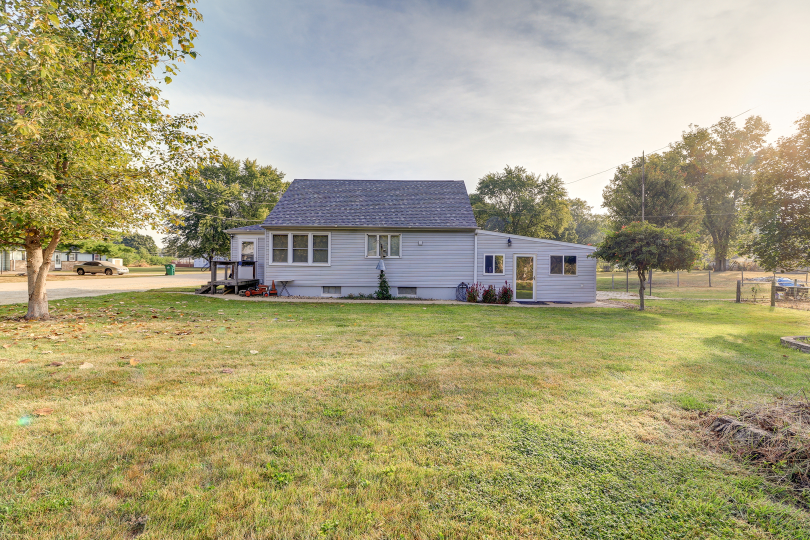 24839 Indian Ridge Road Sterling, IL 61081 - Photo 7 of 33 a house view with swimming pool in front of it