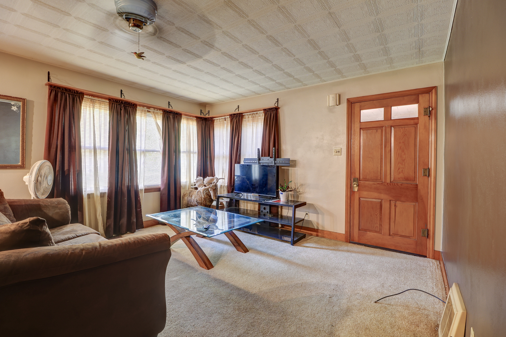 24839 Indian Ridge Road Sterling, IL 61081 - Photo 10 of 33 a living room with furniture and a window