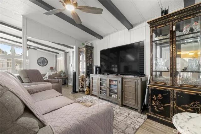 a living room with furniture and a window