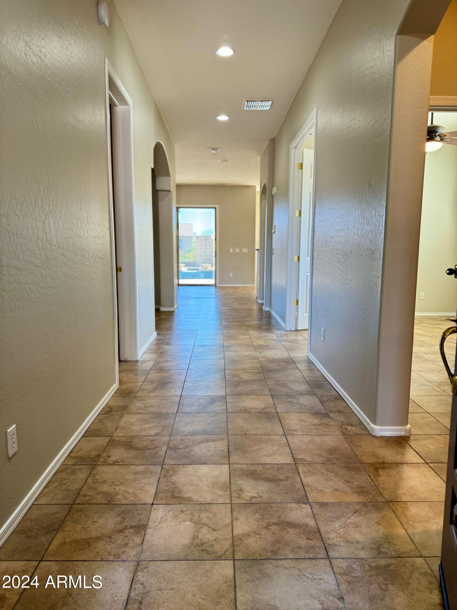 18426 West Piedmont Road Goodyear, AZ 85338 - Photo 4 of 25 a view of hallway with hallway