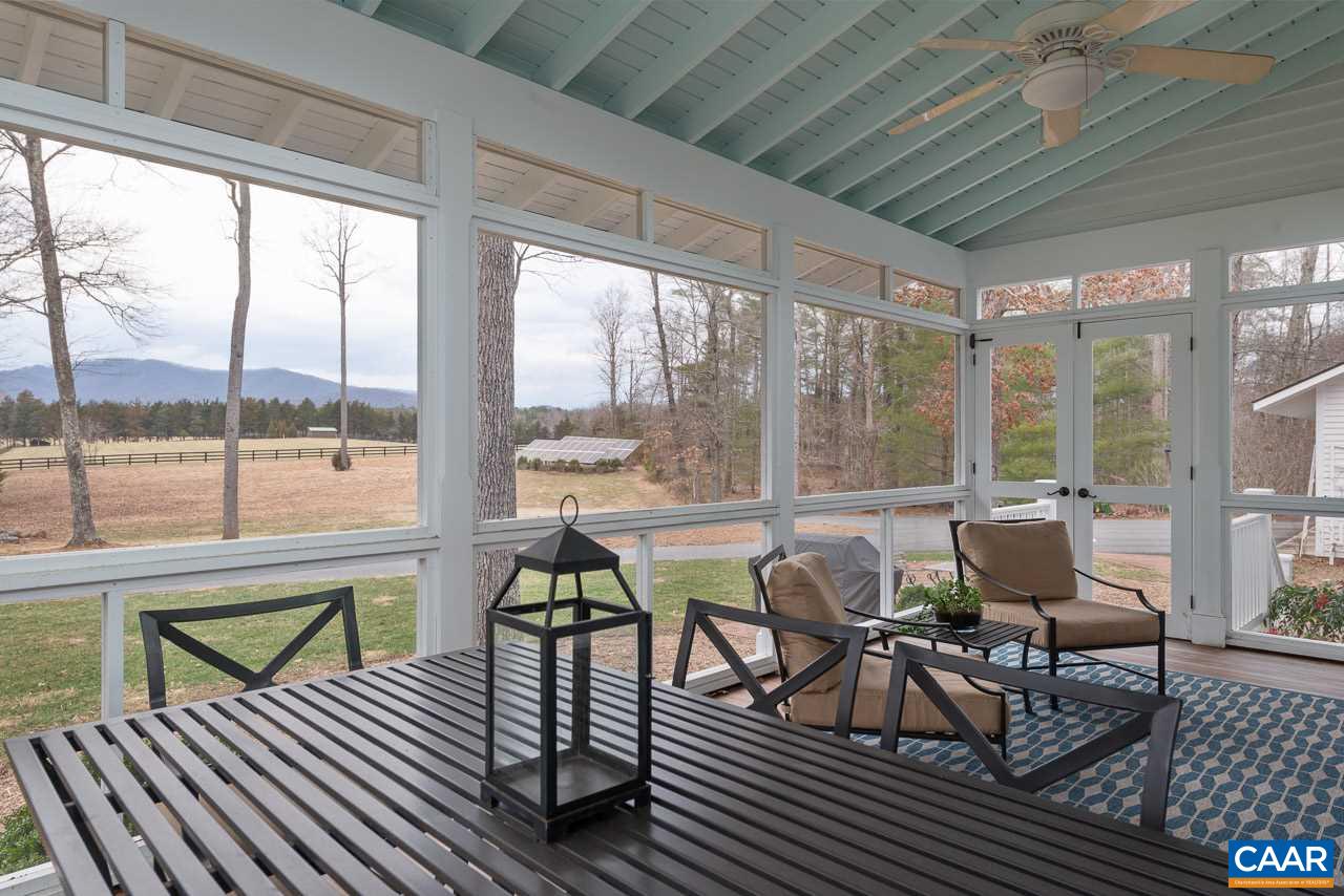 2340 Homestead Farm Road Free Union, VA 22940 - Photo 16 of 47 a balcony with chairs and table