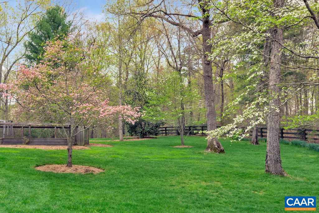 2340 Homestead Farm Road Free Union, VA 22940 - Photo 40 of 47 a garden with trees in the background