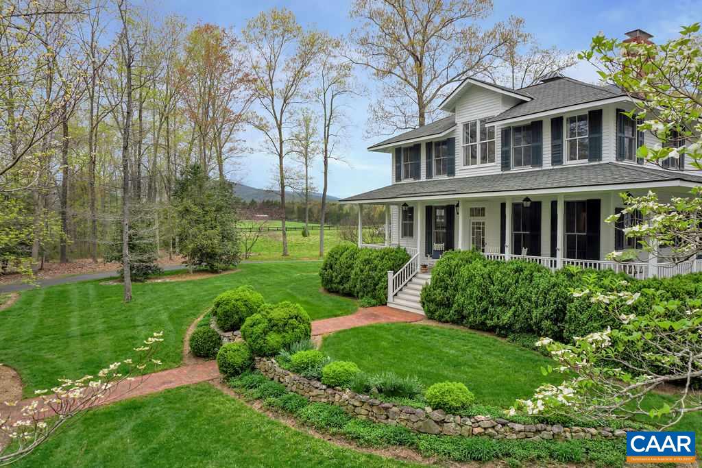 2340 Homestead Farm Road Free Union, VA 22940 - Photo 4 of 47 a view of a brick house with a yard and potted plants