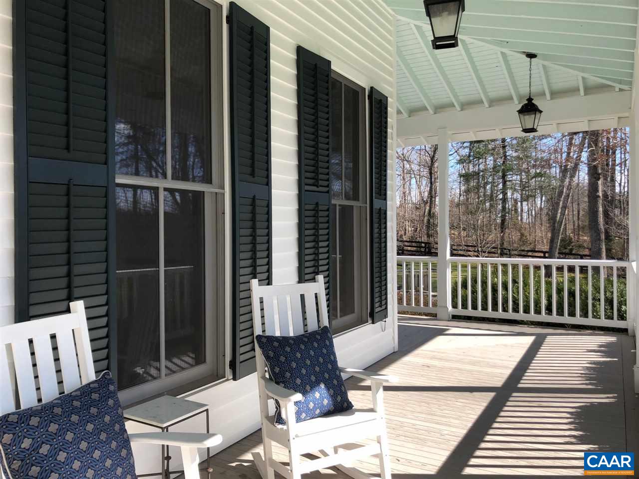 2340 Homestead Farm Road Free Union, VA 22940 - Photo 6 of 47 a balcony with table and chairs