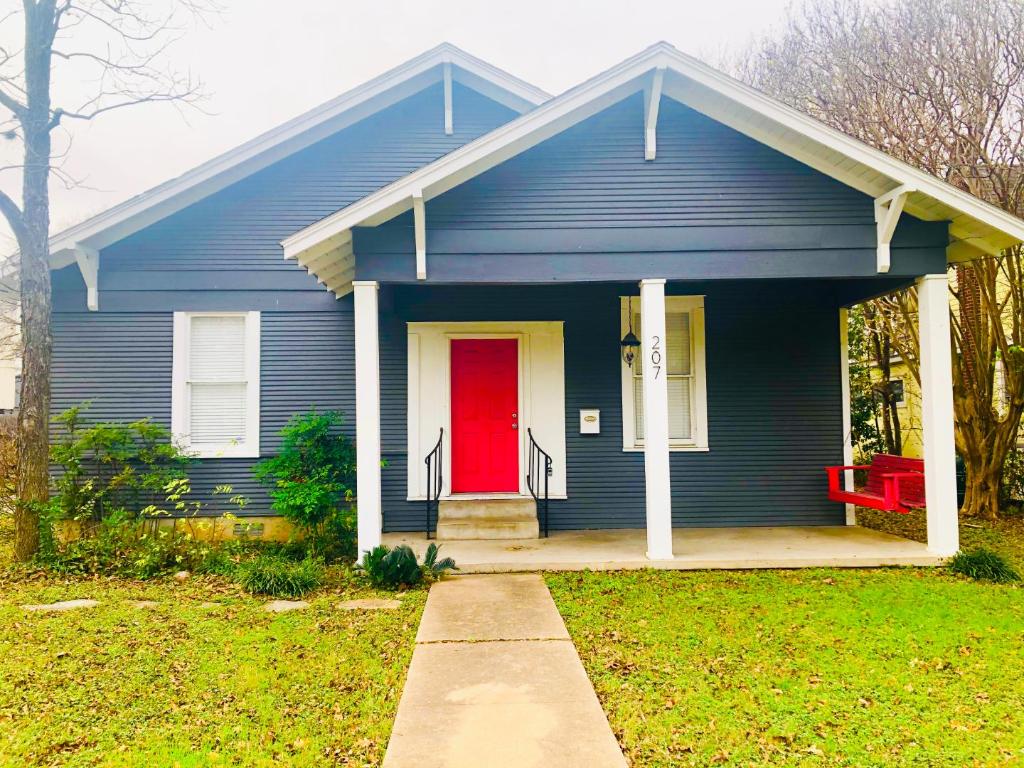 a view of swimming pool with a yard