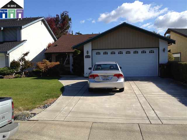 919 Coral Ridge Circle Rodeo, CA 94572 - Photo 1 of 1 a car parked in front of a house
