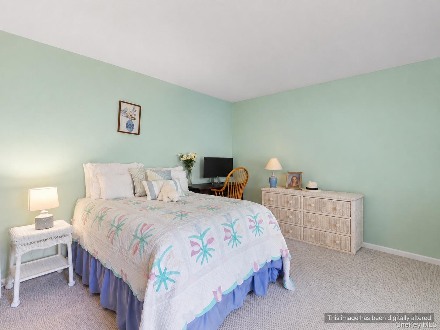 5045 Main Bayview Road Southold, NY 11971 - Photo 13 of 30 a bedroom with a bed and a lamp on dresser