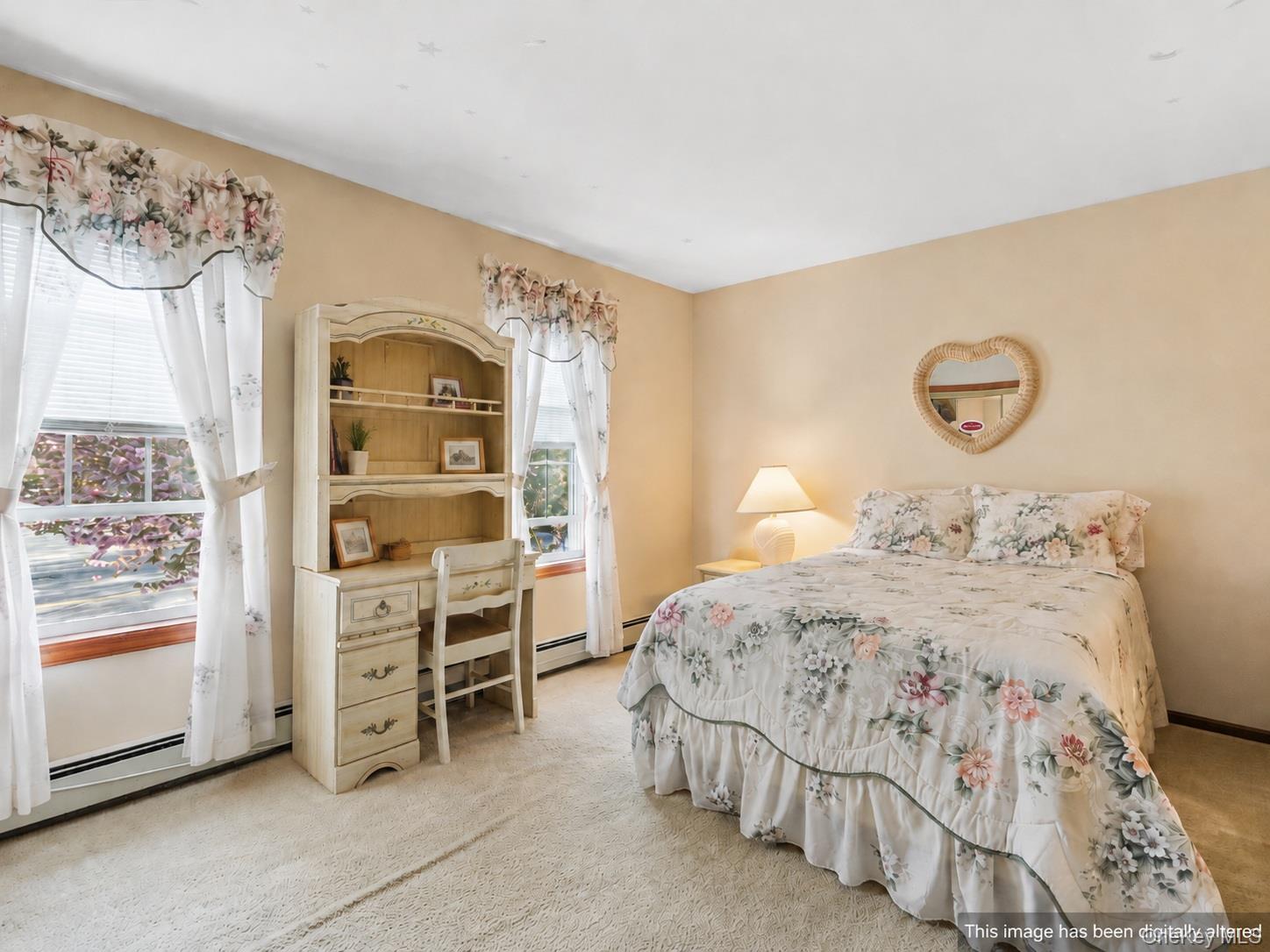 5045 Main Bayview Road Southold, NY 11971 - Photo 16 of 30 a bedroom with a bed and a window