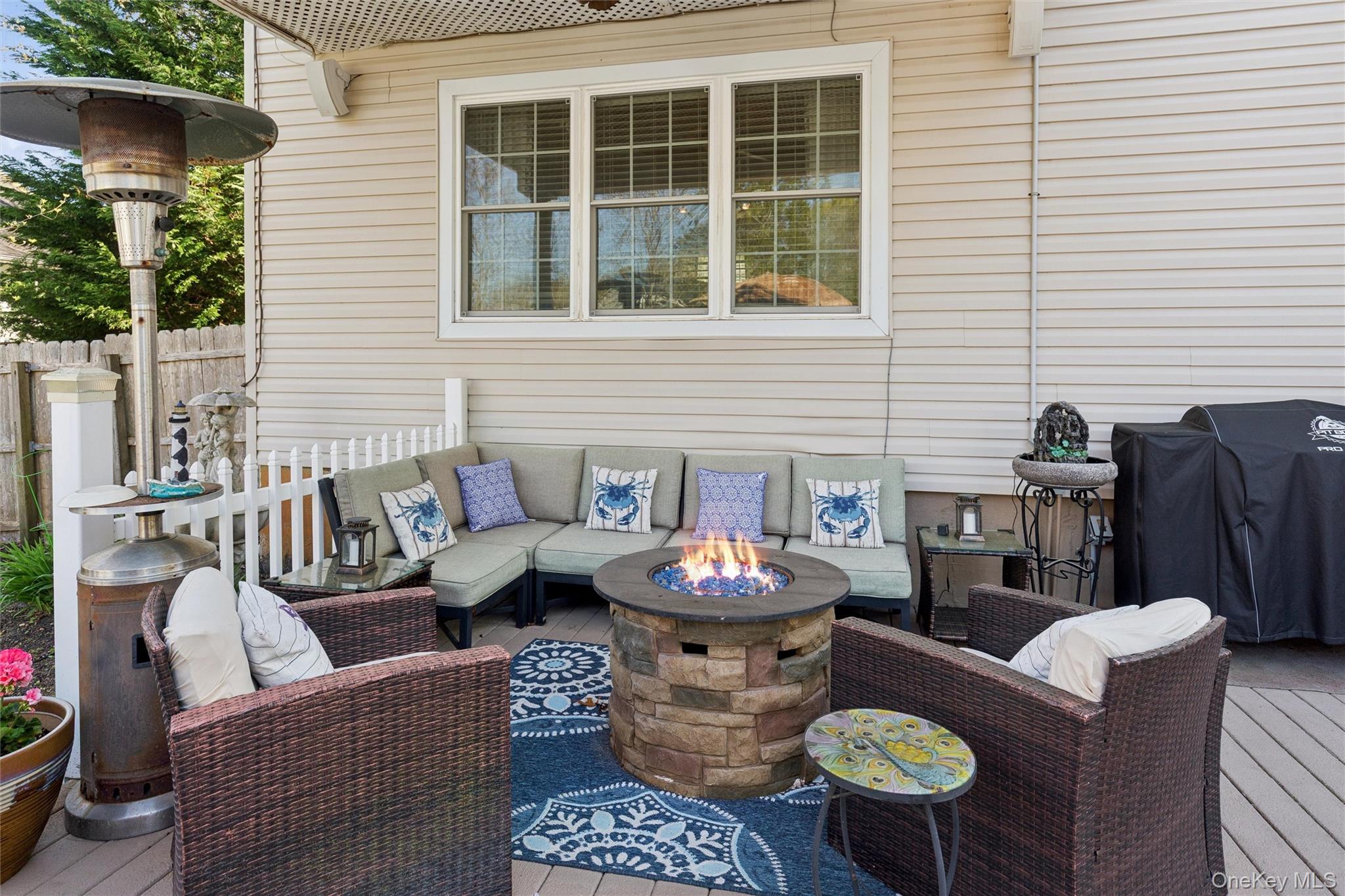 5045 Main Bayview Road Southold, NY 11971 - Photo 19 of 30 a outdoor living space with furniture and potted plants