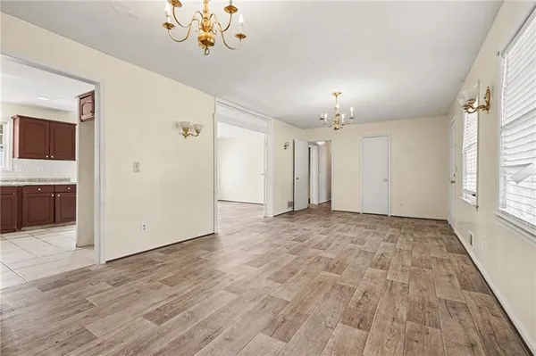 a view of an empty room with a window