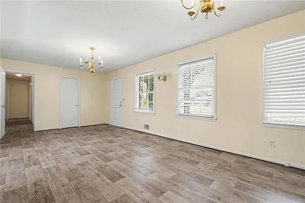 an empty room with windows