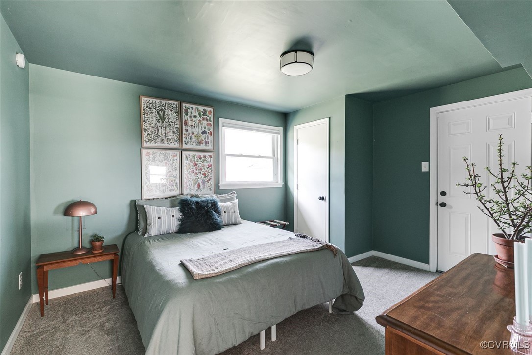 5615 Lipton Road Richmond, VA 23225 - Photo 23 of 38 First floor bedroom with sophisticated palette, ca