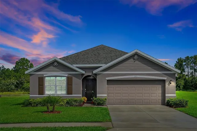 a view of outdoor space with signage and flags