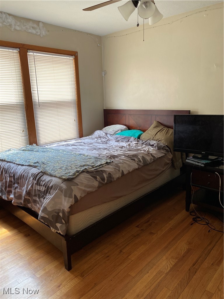 673 Babbitt Road Euclid, OH 44123 - Photo 15 of 32 Bedroom with ceiling fan and hardwood / wood-style floors