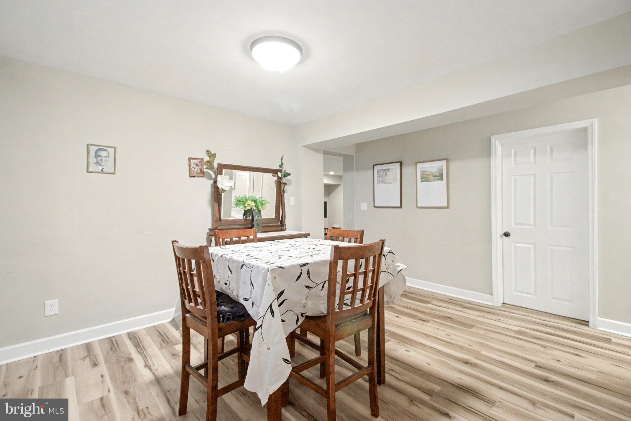 1310 Goldenville Road Gettysburg, PA 17325 - Photo 12 of 29 a view of a dining room with furniture and wooden floor