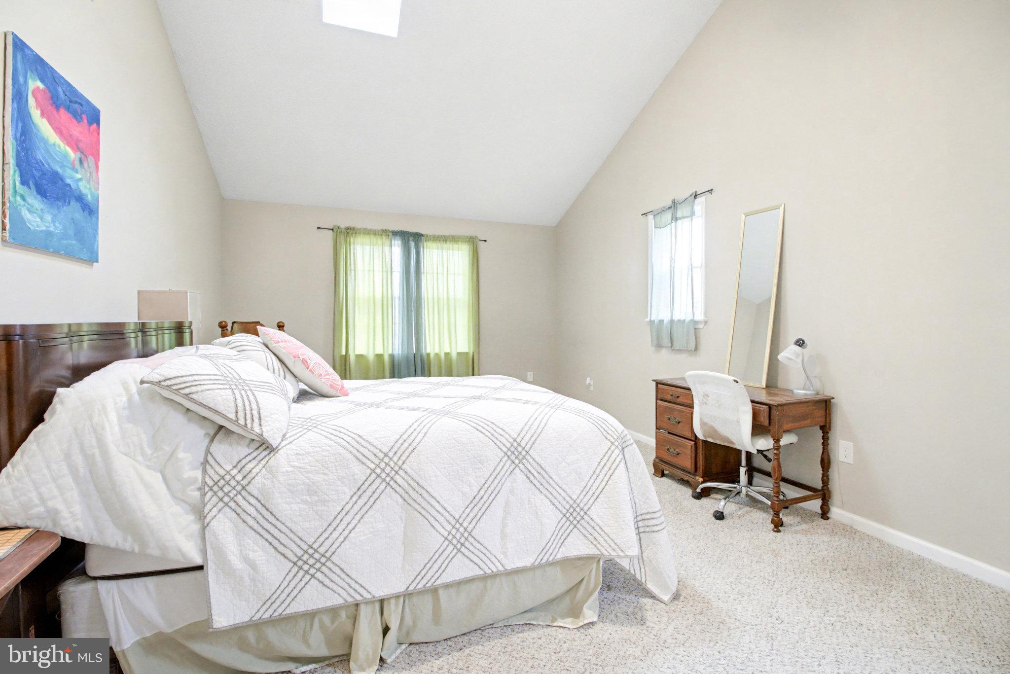 1310 Goldenville Road Gettysburg, PA 17325 - Photo 18 of 29 a bedroom with a bed a table and chair