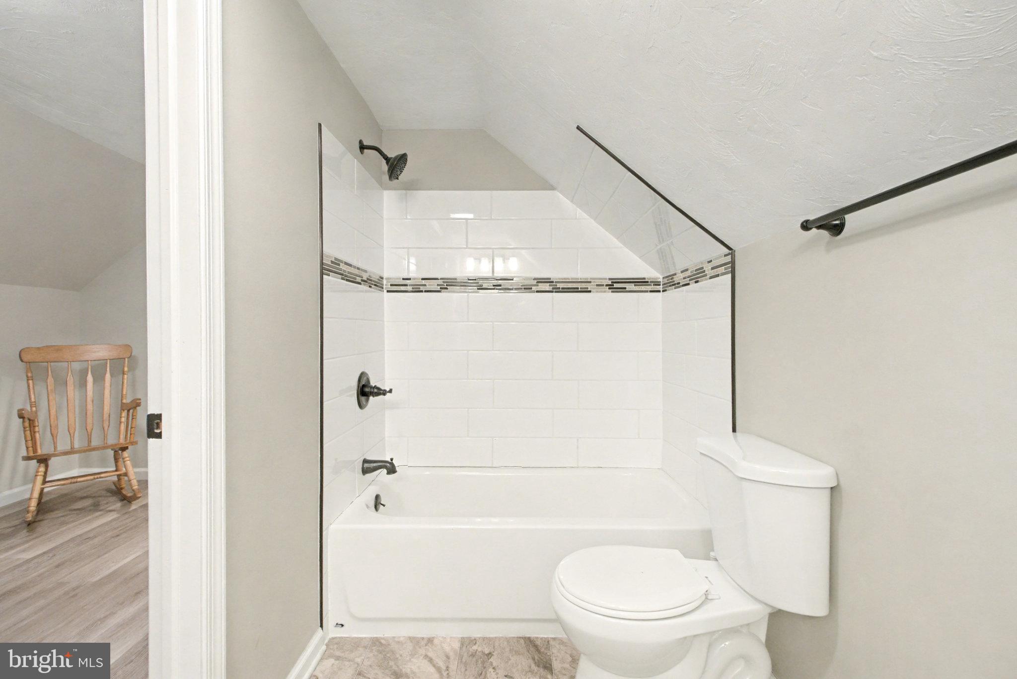 1310 Goldenville Road Gettysburg, PA 17325 - Photo 20 of 29 a bathroom with a granite countertop sink mirror vanity and toilet