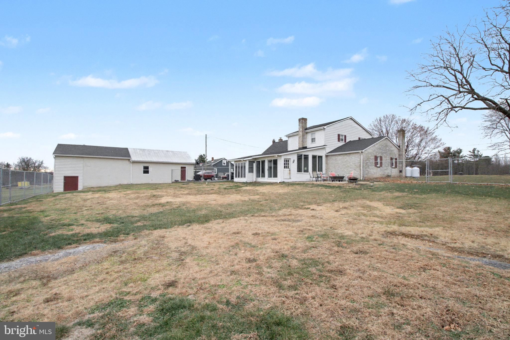 1310 Goldenville Road Gettysburg, PA 17325 - Photo 25 of 29 a view of a house with a yard