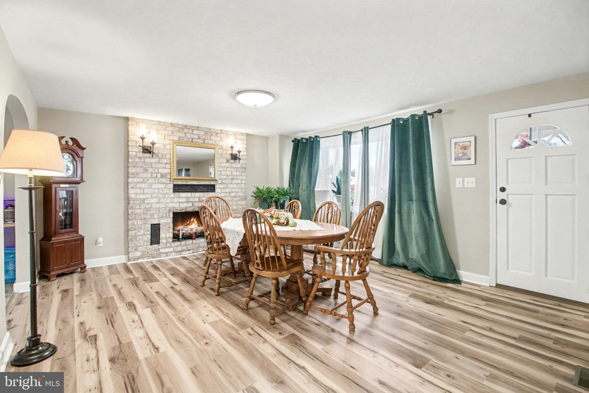 1310 Goldenville Road Gettysburg, PA 17325 - Photo 5 of 29 a view of a dining room with furniture and wooden floor