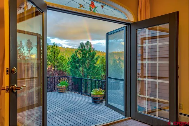 a view of a wooden deck with a patio