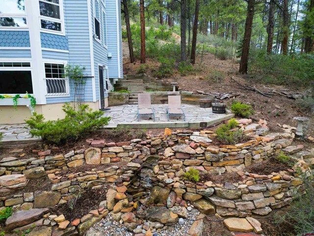 a view of a garden with pathway