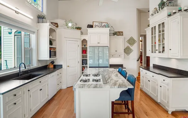 a bathroom with a sink double vanity and a mirror