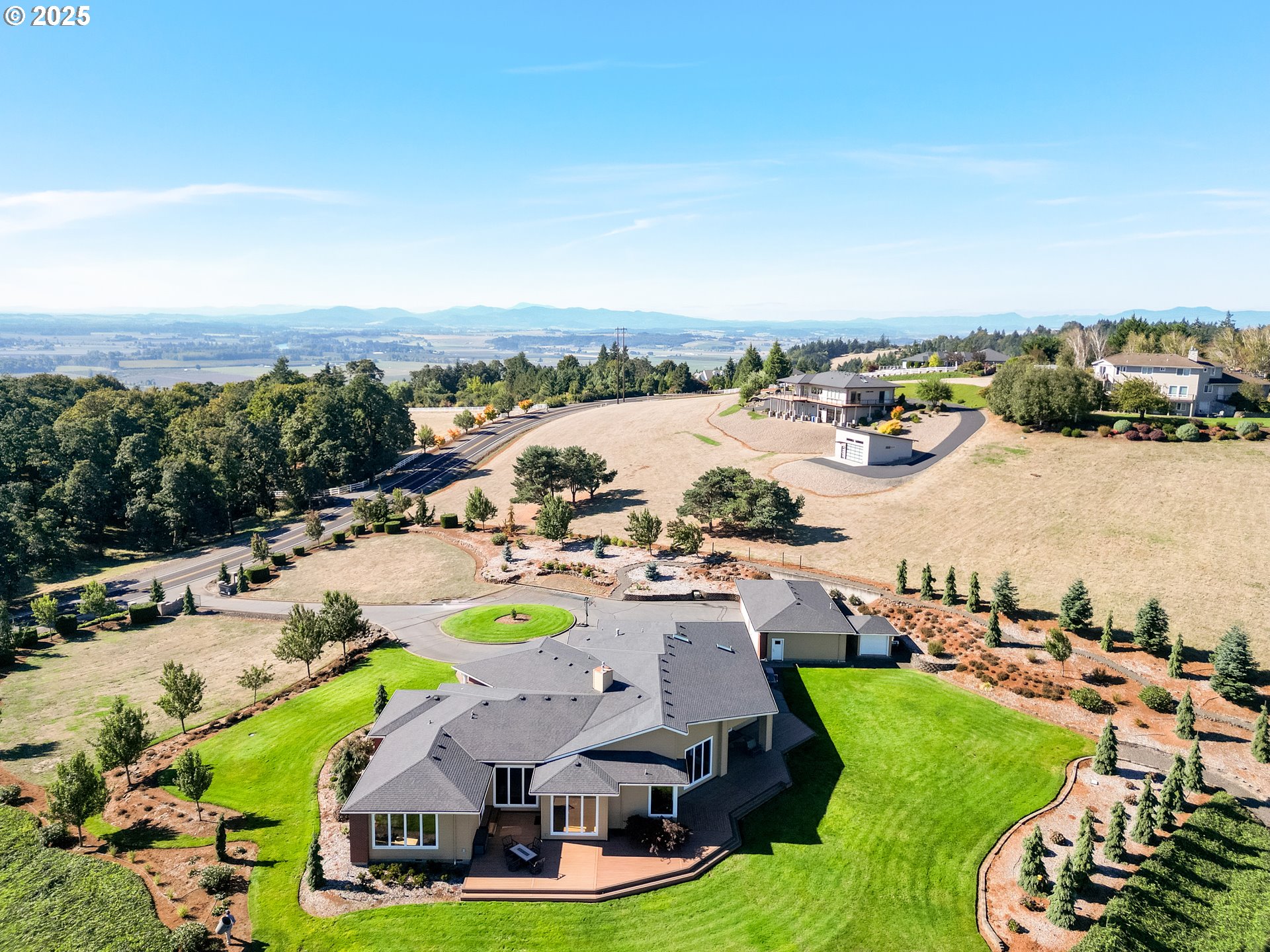 2721 Concomly Road South Salem, OR 97306 - Photo 46 of 48 an aerial view of a house with a swimming pool and lake view