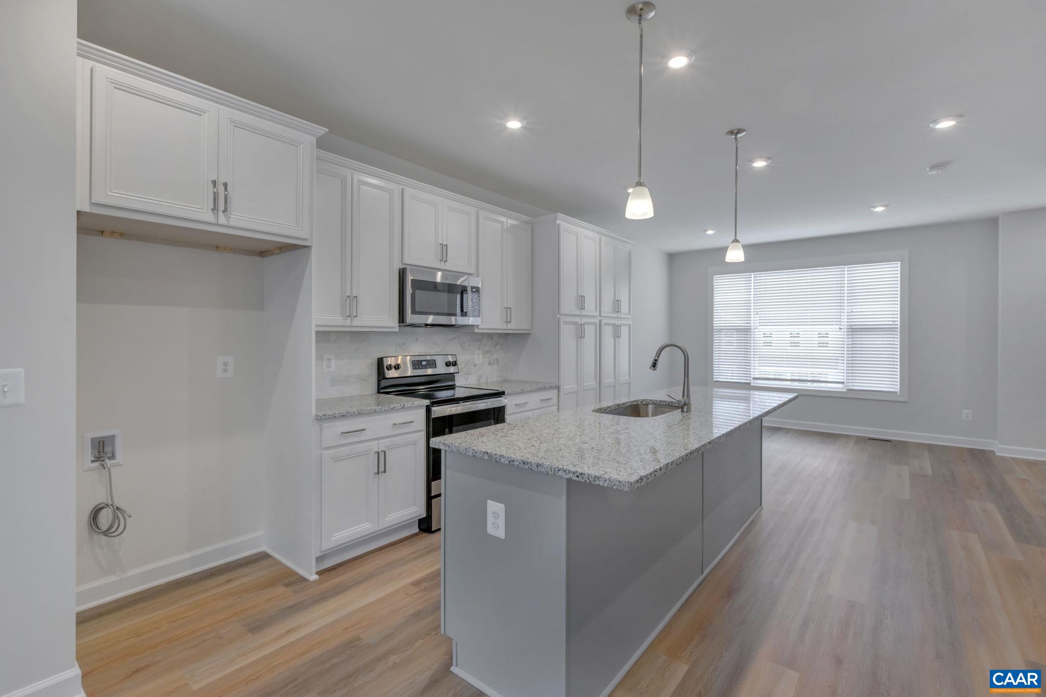 3153 Horizon Road Charlottesville, VA 22902 - Photo 15 of 39 a kitchen with white cabinets and appliances