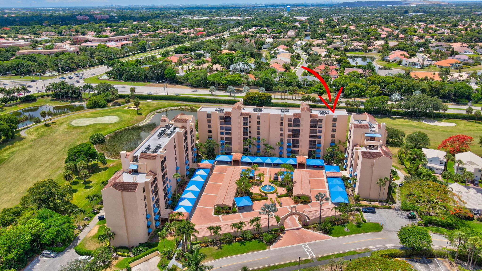 7194 Promenade Drive, Unit 102 Boca Raton, FL 33433 - Photo 3 of 56 an aerial view of residential house with outdoor space and pool view