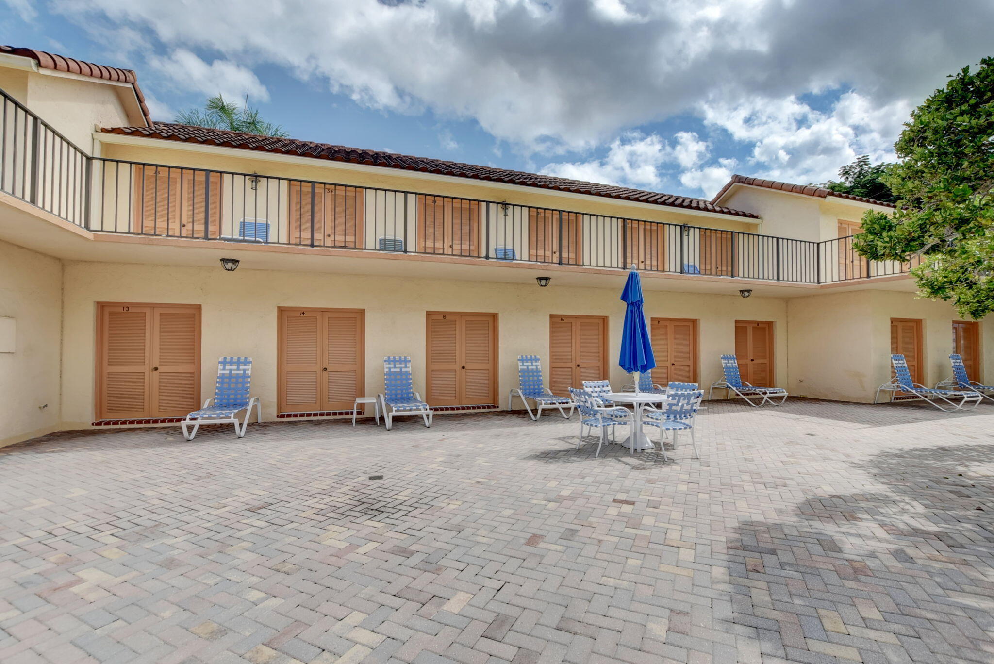7194 Promenade Drive, Unit 102 Boca Raton, FL 33433 - Photo 47 of 56 a view of a house with barbeque and sitting area