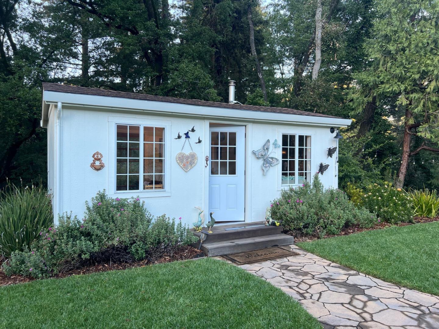 3247 Soquel San Jose Road Soquel, CA 95073 - Photo 16 of 34 a front view of a house with a garden