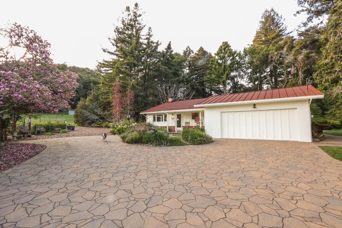 3247 Soquel San Jose Road Soquel, CA 95073 - Photo 2 of 34 a view of a house with a yard and potted plants