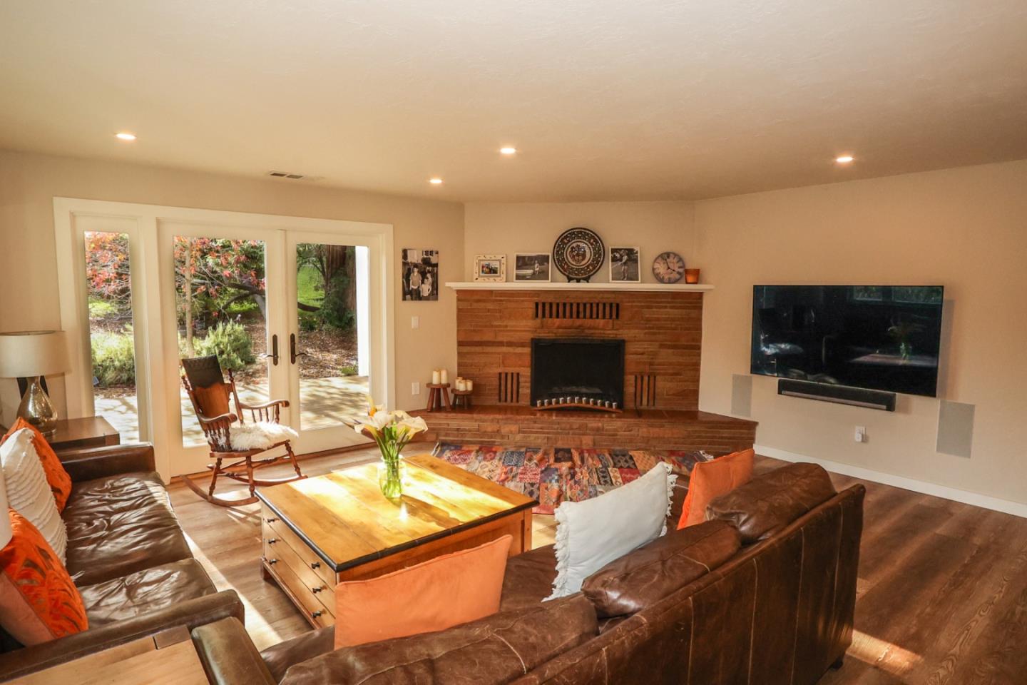 3247 Soquel San Jose Road Soquel, CA 95073 - Photo 3 of 34 a living room with furniture a flat screen tv and a fireplace