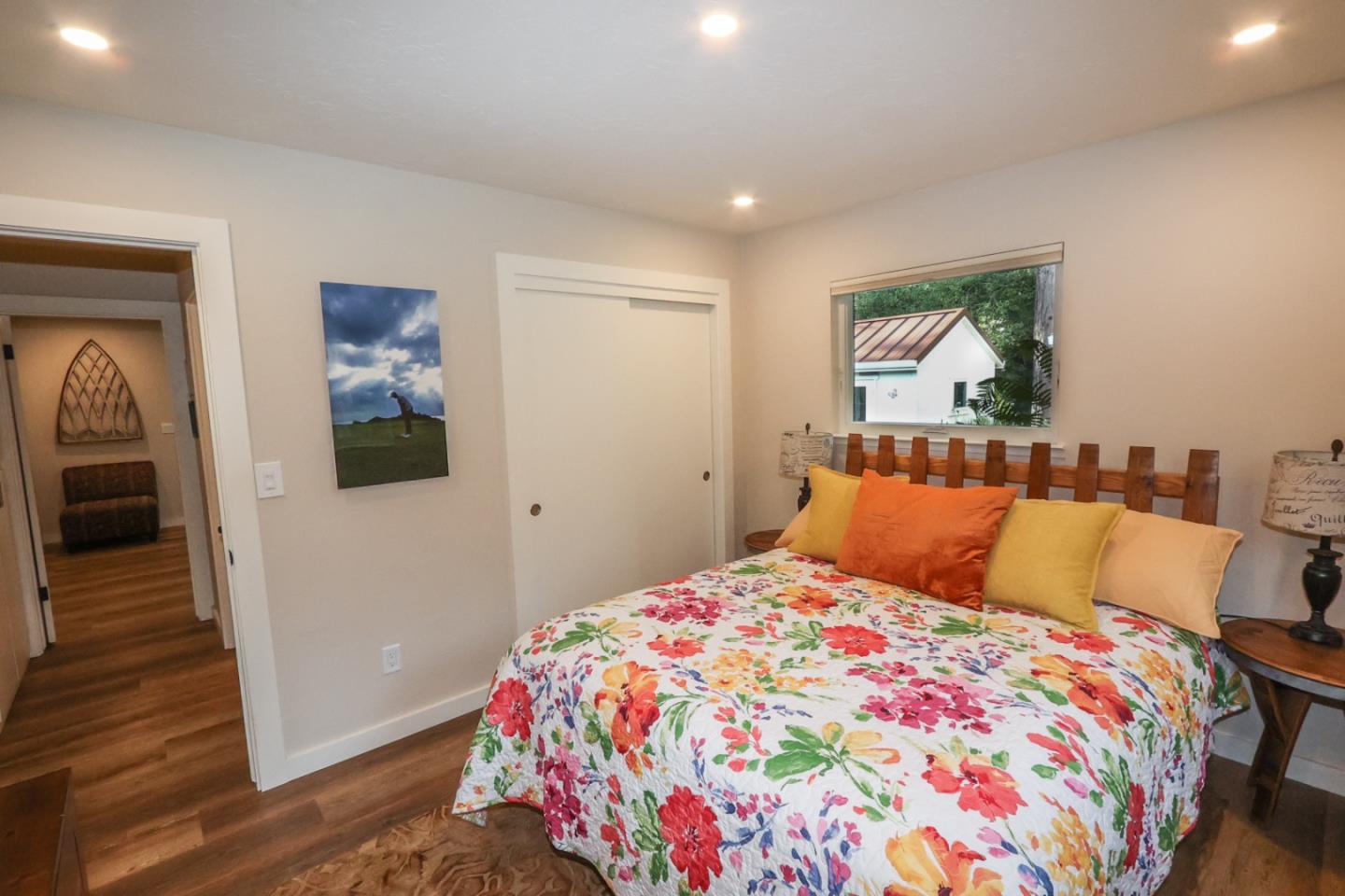 3247 Soquel San Jose Road Soquel, CA 95073 - Photo 9 of 34 a bedroom with a bed and painting on the wall