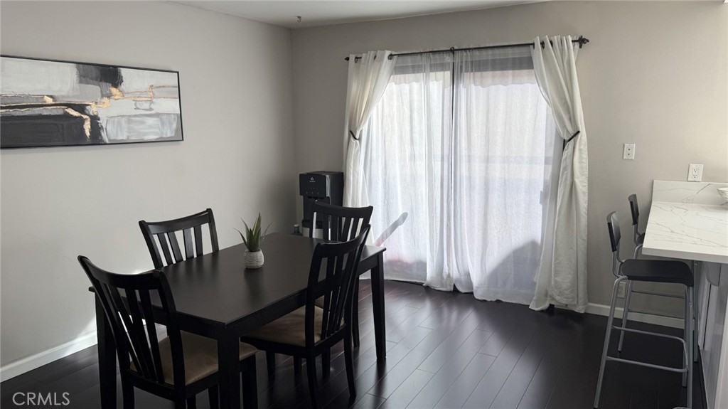11300 Foothill Boulevard, Unit 33 Lakeview Terrace, CA 91342 - Photo 3 of 19 a view of a dining room with furniture and window