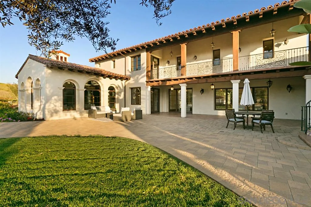 7620 Iluminado San Diego, CA 92127 - Photo 20 of 25 a swimming pool with outdoor seating and yard