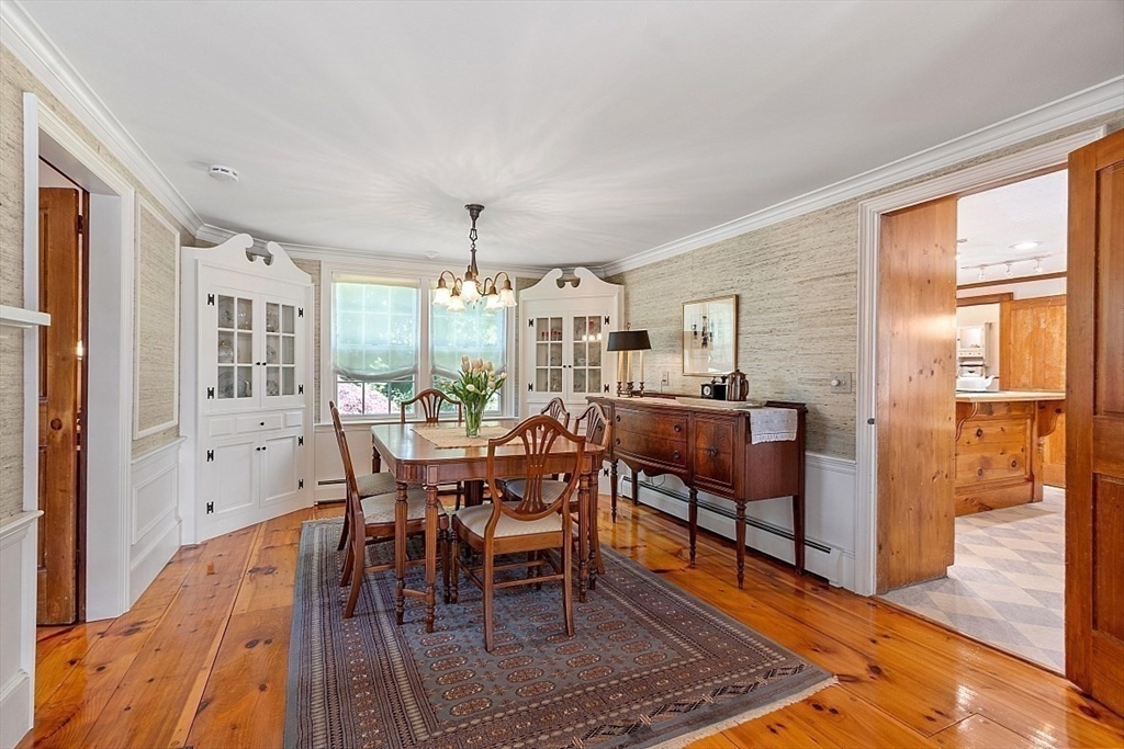 15 Osgood Road Sterling, MA 01564 - Photo 11 of 31 a view of a dining room with furniture and wooden floor