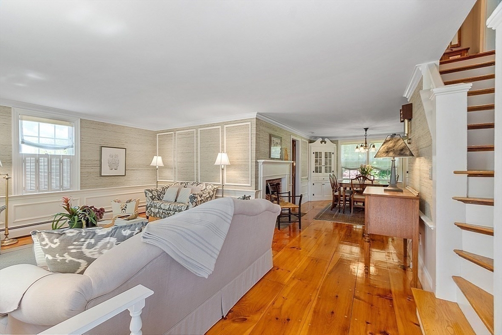 15 Osgood Road Sterling, MA 01564 - Photo 15 of 31 a living room with furniture and a wooden floor