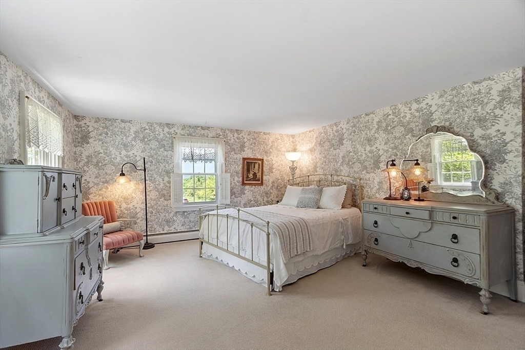 15 Osgood Road Sterling, MA 01564 - Photo 17 of 31 a spacious bedroom with a bed and window