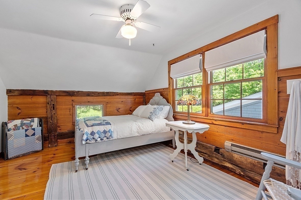 15 Osgood Road Sterling, MA 01564 - Photo 23 of 31 a living room with furniture and wooden floor