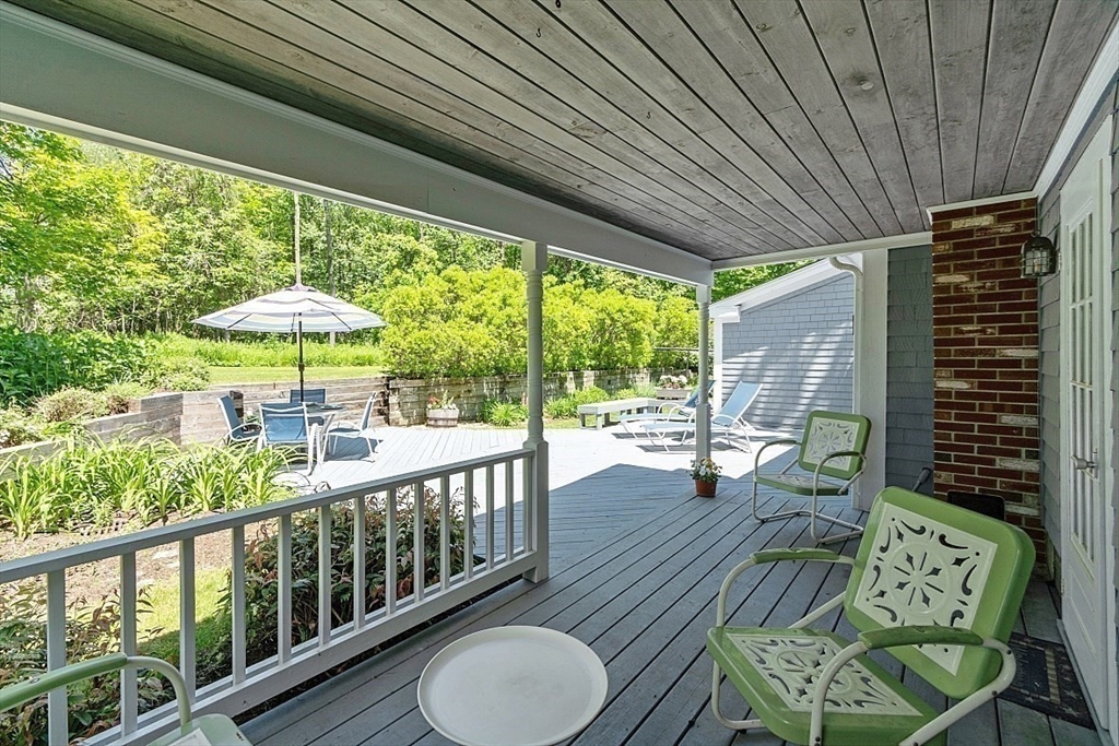 15 Osgood Road Sterling, MA 01564 - Photo 25 of 31 a balcony with furniture and wooden floor